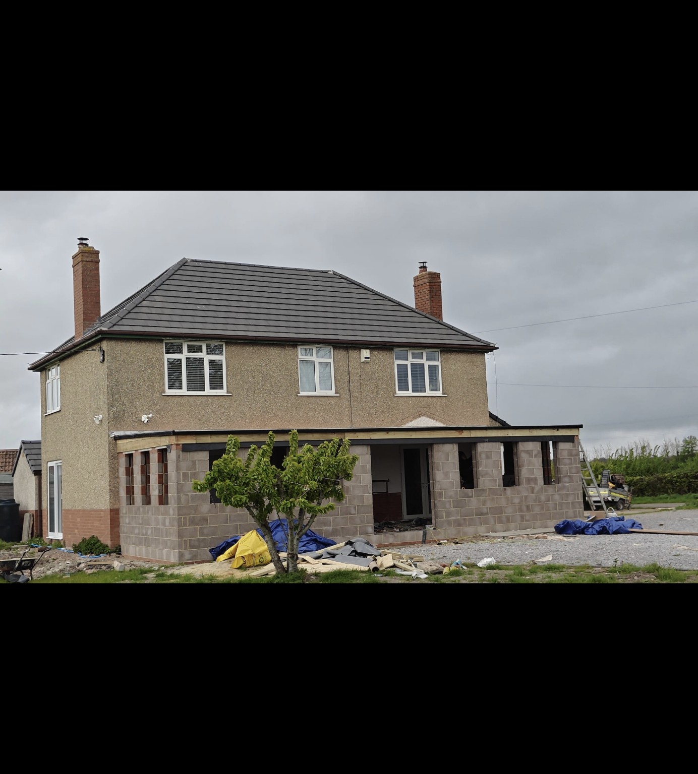 Side view of the grey pitched roof on an Ominiworks project in Bridgwater